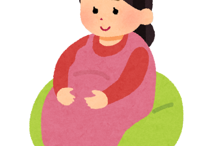 女性が妊娠している様子